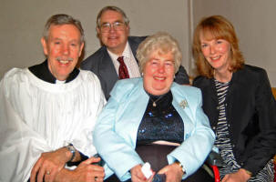 The Rev. Alan Millar pictured with his wife Iris at his farewell service in Garvaghy Parish Church on 3rd September 2006.  Included in the picture is George Musgrave - People�s Warden and Melanie Spiers - Rector�s Warden.