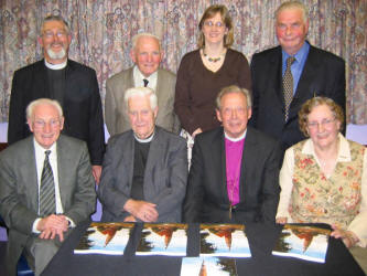 The present rector and former rector and curates pictured at the launch of Dean Norman Barr�s new book last Thursday evening (29th June) at Christ Church, Derriaghy.  L to R: (seated) Canon Terence Rogers - former curate at Derriaghy, Dean Norman Barr - former rector, Rt. Revd Samuel Poyntz - former Bishop of Connor and Mrs Florence Barr.  (back row) The Revd John Budd - present Rector, Canon James Musgrave - former curate, Miss Heather Barr and Canon Adam Johns - former curate.