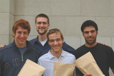 Matt Craig - Youth Director at First Lisburn (second from left) is pictured after distributing Student Packs to three young members of the congregation about to start University courses.  L to R:  Greg Thompson, Neil Graham and Ian Robinson.