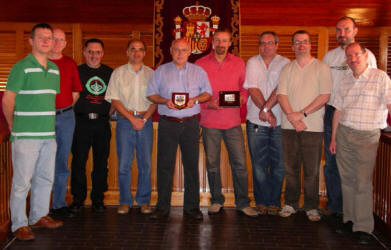 Local music group �Slemish� pictured at an exchange of city plaques during their trip to Puertollano, Spain on Monday 10th to Tuesday 16th October. L to R: Paul McComiskey (Lambeg Baptist), Andrew Herron (Baptist Missions France), George Allen (Lambeg Baptist), the Pastor of Puertollano Church, the Minister of Culture - Puertollano, David Montgomery (Moira Baptist), David Black (Lambeg Baptist), Nigel Cameron (Strandtown Baptist), Ivan Adair (Lambeg Baptist) and Albert Smylie (Lisburn Baptist).
