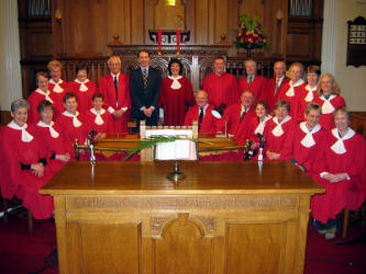 Railway Street Presbyterian Church Choir pictured at the Evening of Easter Music and Readings on Palm Sunday. L to R: (front row) Valerie Henderson, May McConnell, Anne King, Rosemary Henderson, Jay Mateer, Billy Bittle, Laura Bittle, Anne McAllister, Pauline Adair and Julie McConaghie. (back row) Joy Crothers, Elizabeth Menown, Dorothy McClelland, Colin McLean, Peter Wilson - Guest Organist, Janet Ferguson - Director of Music, Wilson Graham - Guest Bass, Keith Bailie, Don Mitchell, Bertha Cowan, Elizabeth Bridgett and Aileen Patterson.