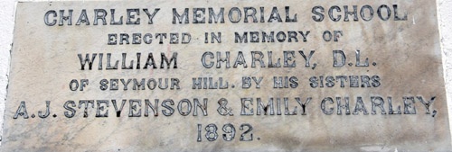 Stone panel at Charley Memorial School