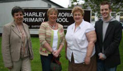 At the BBQ in Charley Memorial Primary School last Friday night are L to R: Ann Robinson (former teacher), Yvonne Woods (Former teacher), June Latimer (lollipop lady) and Stuart Dickinson (former teacher).