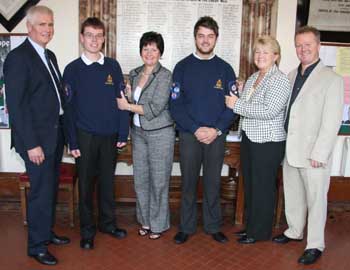 Staff Sergeants Rowan Davidson and Jamie McCutcheon of 1st Lisburn Boys' Brigade Company received the Queen's Badge (the highest award a BB member can gain) from their proud mothers Beryl and Jayne last Sunday morning (23rd September). Looking on are Rowan's father Tom (left) and Jamie's father Seamus (right). Staff Sergeant Chris Baird, who also gained the Queen's Badge, was on holiday and unable to attend last Sunday's service. 