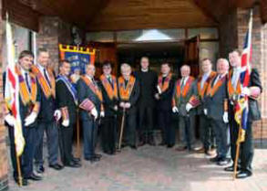 District Officers and Standard Bearers pictured at the Lower Iveagh District Service in Dromore Free Presbyterian Church on Sunday 1st July. L to R: Geoffrey Bradford - Standard Bearer, Jim Wilkinson - County Representative, Richard Martin - Standard Bearer, Eric Jess - Worshipful District Master, David Hobson - District Secretary, Rev Gerry Sproule - District Grand Chaplain, Rev Ian Kenny - Minister of Dromore Free Presbyterian Church, Rev David McLaughlin - Minister of Carryduff Free Presbyterian Church, Robert Murphy - District Lay Chaplain, William Martin - Assistant District Treasurer, Norman Dewart - District Tyler and Gareth Lough - Standard Bearer