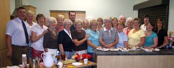 Serving supper at the Holiday Bible Club BBQ in Lisburn Baptist Church on Friday 24th August are L to R: Pastor John Taylor, Margaret Morrison, Iris Laird, Jean Watson, Emma Porter, Gina Lloyd, David Spence, Helen McBride, Helen Martin, Nora Cathcart, Karen McLean, Alison Wasson, Edith Magill, Joan Ogle, Sylvia Gray, Irene Rea, Joan Madden, Christine Taylor, Janice Lloyd and Jacqueline Madden.