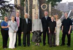Canon Cochrane and his family pictured at a service marking his final sermon as Senior Minister of Christ Church Parish. L to R: Eleanor, Emma, Michael, Ken, Mildred, Peter, Christopher, Deardrie and Simon.