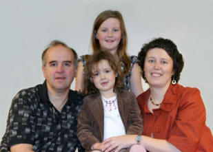 Karen Blythe pictured at Railway Street Presbyterian Church last Sunday morning with her husband Brian and their daughters Sophie and Kate-Lynn.