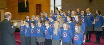 Wesley Wright (conductor) and Killowen Primary School pictured at the Action Cancer Family Service of Celebration and Praise in Trinity Methodist Church.