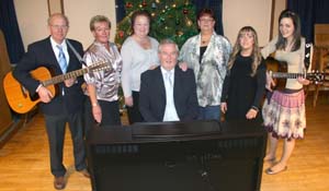 The newly formed Derryvolgie Singers pictured at the '
Festival of Nine Lessons and Carols'
in St Columba'
s, Derryvolgie last Sunday evening (16th December). L to R: Jim Hamilton, Liz Spence, Thelma Campbell, Karen McIvor, Emma-Louise Spence, Lindsay Hamilton and Graham Murphy (seated at keyboard).