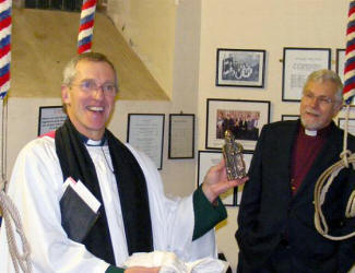 The Rector, the Rev John Dinnen thanks the Hillsborough Parish Bellringers for their gift. Looking on is the Bishop of Down & Dromore, the Right Rev Harold Miller.