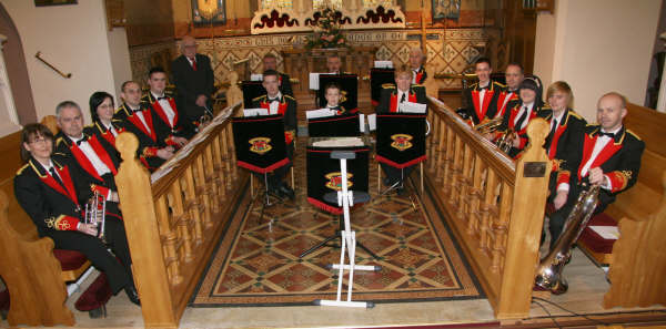 Symington Memorial Silver Band, conducted by Mr Ernie Hewitt (left at back) led the praise at morning worship in Christ Church Parish last Sunday (24th February).