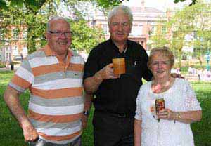 Father Dermot with parishioners Jim and Jean Curran.