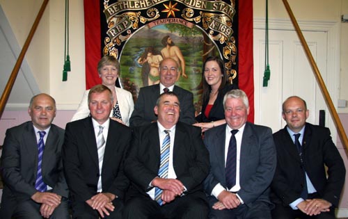 Pictured against the banner of RPB No 169 showing the Biblical scene �Adam and Eve� are musicians and singers who took part in �My Favourite Hymns� at Dromore Orange Hall last Sunday evening