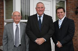 Past and present ministers of Mount Zion Free Methodist Church pictured at the dedication of the new manse. L to R: Rev Fergus Bell (1991-1995), Rev Joe Woods (2000-2004) and the present minister, Pastor Nick Serb. 