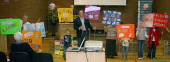 Keith Parker pictured with some of the children who took part in the service.