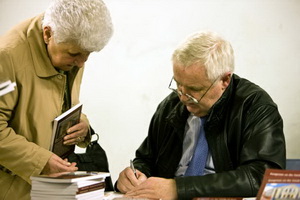 Helping Hands May Griffin a member of Helping Hands, gets a book signed.