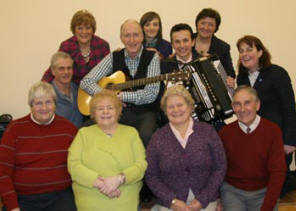 George Hamilton IV and John Walker pictured with L to R: (front row) Brian, Hazel, Esther and Desmond Law. (second/back row) Jim and Hilda Law, Rachel and Eunice Hoey and the Rev Patsy Holdsworth.