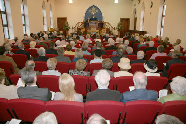 Pastor Clifford Morrison gives his response to the history of the call.