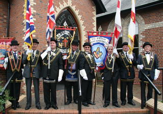 Lisburn Royal Black District Chapter No 1 and Largymore Royal Black District Chapter No 9 colour party. L to R: Sir Knights - Fred Willoughby, Jim Logan, Nigel Stewart, William Wilkinson, Roy Douglas, Wilfie Brown, Gerald Dillon and George Dickson.