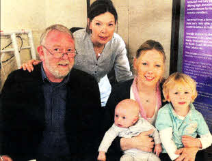 Lisburn Downtown Centre Committee Chairman Colin McKay with his wife Mary, daughter Rosemary Shawe and grandchildren Alfie and Jamie.