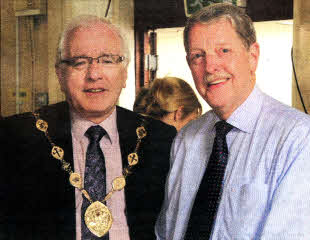 The Mayor, Councillor Allan Ewart, with Percy McCall of McCalls Menswear, one of the local businesses who donated to the charity auction.