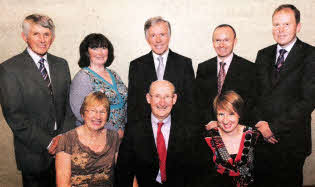 At the `Farewell Reception' are L to R: (front row) Rev Canon Ernest Harris, Ray Harris and Trish Harris. (back row) John Tuft (Rector's Churchwarden), Edith Haddock (Church Secretary), Robert Yarr (organist), Dr Andrew Sands (Vestry) and Andrew Clarke (People's Churchwarden).