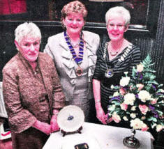 At Legacurry Wl's 60th Anniversary dinner are Ethel Patterson (Federation Chairwoman), Gillian Hunter (President), and Ann McCurdy US0811-403PM Pic by Paul Murphy