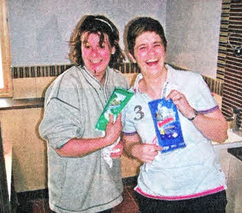 Hillsborough Parish Choir members Michelle Hutchinson and Nicola Prentice help prepare the new rectory.