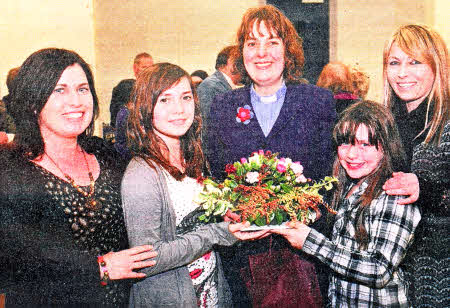 Esther and Hilda Law present a gift to the Rev Patsy Holdsworth on behalf of Kilwarlin Moravian Church.