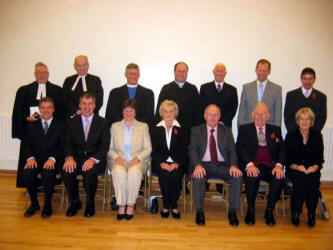 Newly ordained elders pictured with the Commission from the Presbytery of Dromore at Hillhall Presbyterian Church on Sunday 6th November 2005. L to R: (front row) Russell Andrews, Alan Beattie, Hazel Campbell, Margaret Graham, Winston Graham, James Stewart and Phyllis Walker. (back row) The Rev. Jack Richardson - Minister of Hillhall and Acting Clerk of Dromore Presbytery, Rev. Kenneth Smyth - Drumbo Senior Minister, The Rev. Bobby Liddle - Moderator of Dromore Presbytery, Rev. Adrian McLernon - Minister of Drumbo, John Connor - Hillhall Clerk of Session and Representative Elder, Noel Adams - Legacurry Representative Elder and Roy Patterson - Drumbo Representative Elder.