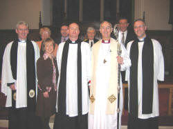 Pictured at the Institution Service in Lisburn Cathedral on Sunday 29th January 2006 is L to R: (front) Rev. Canon Sam Wright, Annette McGrath, Rev. Kenneth McGrath, the Bishop of Connor, the Rt. Rev. Alan Harper and the Rt. Rev. Dr. Maurice Elliott. (back row) Martie Kennedy - Peoples Warden, Keith Neill - Youth and Outreach Worker, Canon Edgar Turner - Registrar and Paul Dougan - Rector�s Warden.