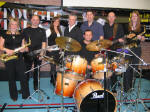 The Blues Brothers band that played at the �Tough Talk� Power Lifting Display in Lisburn Leisureplex on Saturday 24th September 2005.  L to R:  Clare Norris - Saxophone, Lyn Morrow - Guitar, Kim Mitchell - Vocals, Jonny McGeown - Vocals, Stephen McLoughlin - Keyboards, Michael McCormick - Bass, Tonya Craig - Saxophone and Allister Brown - Percussion.