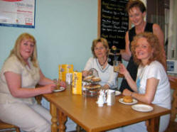 The Avenue, a Coffee House and Business Venue, located on the ground floor of the former Y Club building, is a social economy business which is a development of Stepping Stones NI, a charitable organisation which unlocks the potential of people with learning disabilities by providing progressive preparation for the world of work. The Manager of the Avenue is Carolyn Kerr. Carolyn is pictured with lecturers from the Lisburn Institute of Further and Higher Education who have dropped in for lunch at �The Avenue�. L to R: (seated) Karyn Eldon - Head of Applied Science, Kathy Davison and Meg Courtney.