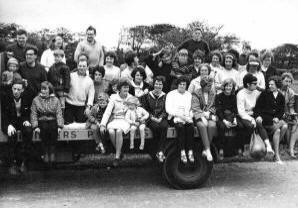 The first Inter Church camp in 1966.  Railway Street Church members in the photo are:  Meta Patterson, third from the left with Trevor (left) and Hazel (right); Heather Henry�s head can just be seen over Meta�s shoulder; Doreen Anderson is directly behind Heather Henry; Carol McClelland (now McBurney) is sixth from the right in the front row; Smyth Patterson is directly behind Carol; Dorothy Rea (now McClelland) is on the right of Smyth; Edith McConnell is extreme right - front row, and Heather McClelland (now Bittle) is in the back row second from the left.