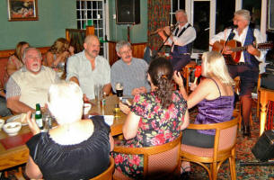 Drew Rowan (left) and Noel McMaster of Bakerloo Junction pictured on Friday 1st September - the first night of the new season�s Friday night sessions at the Ivanhoe Hotel, Carryduff. Included in the photo is former Lisburn man Nelson Williams (left).