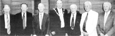 A mixture of senior and past members of the band with Mayor Tinsley.