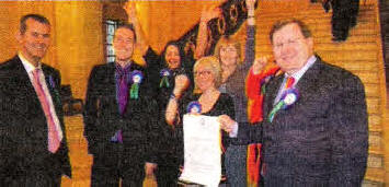 Minister Edwin Poots, and MIAs Paul Givan and Jonathan Craig celebrate with Claire Hughes, Anne Hayward, Arlene Hewitt and Paula McClinton.