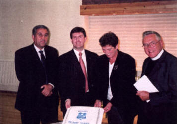 Mr J Fitzsimmons Chief Executive SEELB, Rt Hon Mr J Donaldson MP, MLA, MBE, Mrs E A Moore Principal, Rev Dr J Richardson MBE, at the 50th Anniversary of Hillhall Primary in its current site.