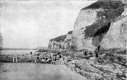 SUN BATHING AT THE WHITE ROCKS, PORTRUSH