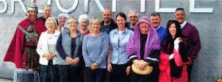 Volunteers from Lisburn Baptist with Rachel Kelly, the presenter of the Amazing Journey to Bible Times. (I-r) John Baird, Victor Watson, Helen McBride, Richard Patterson, Irene Rea, Lillian Robinson, Joan Wright, Stephen Wright, Rachel Kelly, Robin Fields, Gillian Hilland, Jim Ferguson, Gemma Greer, Pastor John Taylor.