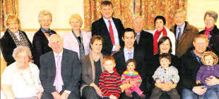 L to R: (front row) Margaret Friel, Philip Price, Rosalynd Price, Ryan Price, Alison Price and Regan West. Also included are Philip and Rosalynd's grandchildren James, Adam, Rachel and Katie. (back row) Norma Halliday, Diana McVicker, Susanne Brown, Basil McCrea MLA, Rev Raymond Devenney, Kathy Devenney, Robert Jordon and Margaret Jordon.