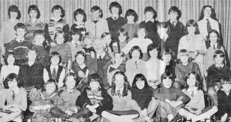 Mr. Graham with some of the pupils who attended the ceremony to mark his retirement. E2302