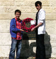 Robin Gilmore and Michael Cochrane lay a wreath at the Ulster Tower.