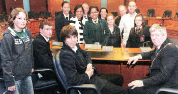 The Mayor of Lisburn, Councillor Brian Heading recently met with young people from local Black and Minority Ethnic communities at Lagan Valley Island. Also pictured (back I-r) are: Mr Stephen Malcolm, the Council's Equality Officer; Ms Monika Lubasinska; Mr David Mitchell, the Council's Good Relations Officer and Mr Rónán McHugh, SEELB Lisburn BME Area Worker.