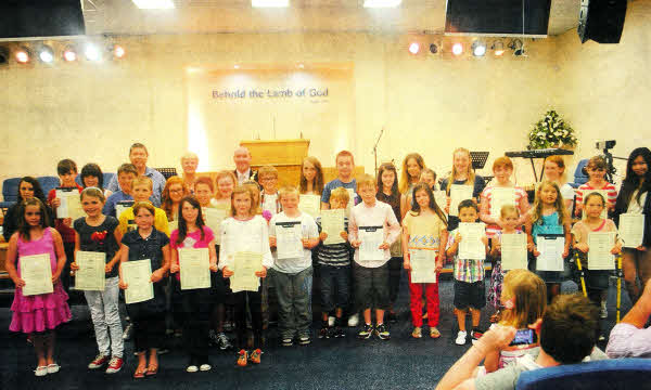 Lisburn Mayor Alderman Leathem, School Principal Stephen McLoughlin and School Administrator Aileen McGarrigle with graduates of Lisburn School of Music Summer 2012