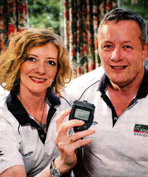 Robin and Joyce Mack, from Maze, getting their stopwatches ready before heading off to London to officiate in the athletics of the Olympic Games. US2712.517cd