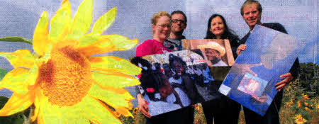 Michael and Vanessa Magown, right, organisers of the Sunflower Fest at Tubbys Farm, Hillsborough, along with Christine McCartney, from Oxfam Ireland and David Pollock from the Belfast Guitar Centre. Absent is Sunflowerfest supporter, Alison McCreery, INUS38-OXFAM