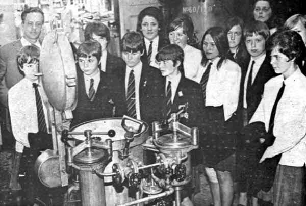 Interested Technical College pupils and teachers being shown over the dyehouse by Mr. S. McCullough 