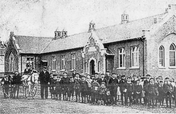The children of Largymore School line up for the camera in the early days of the century.